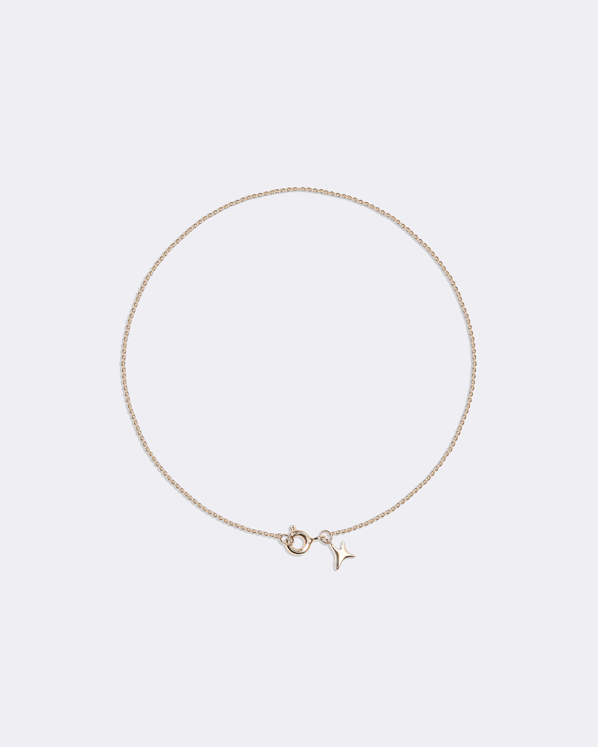 Yellow gold aumi star bracelet