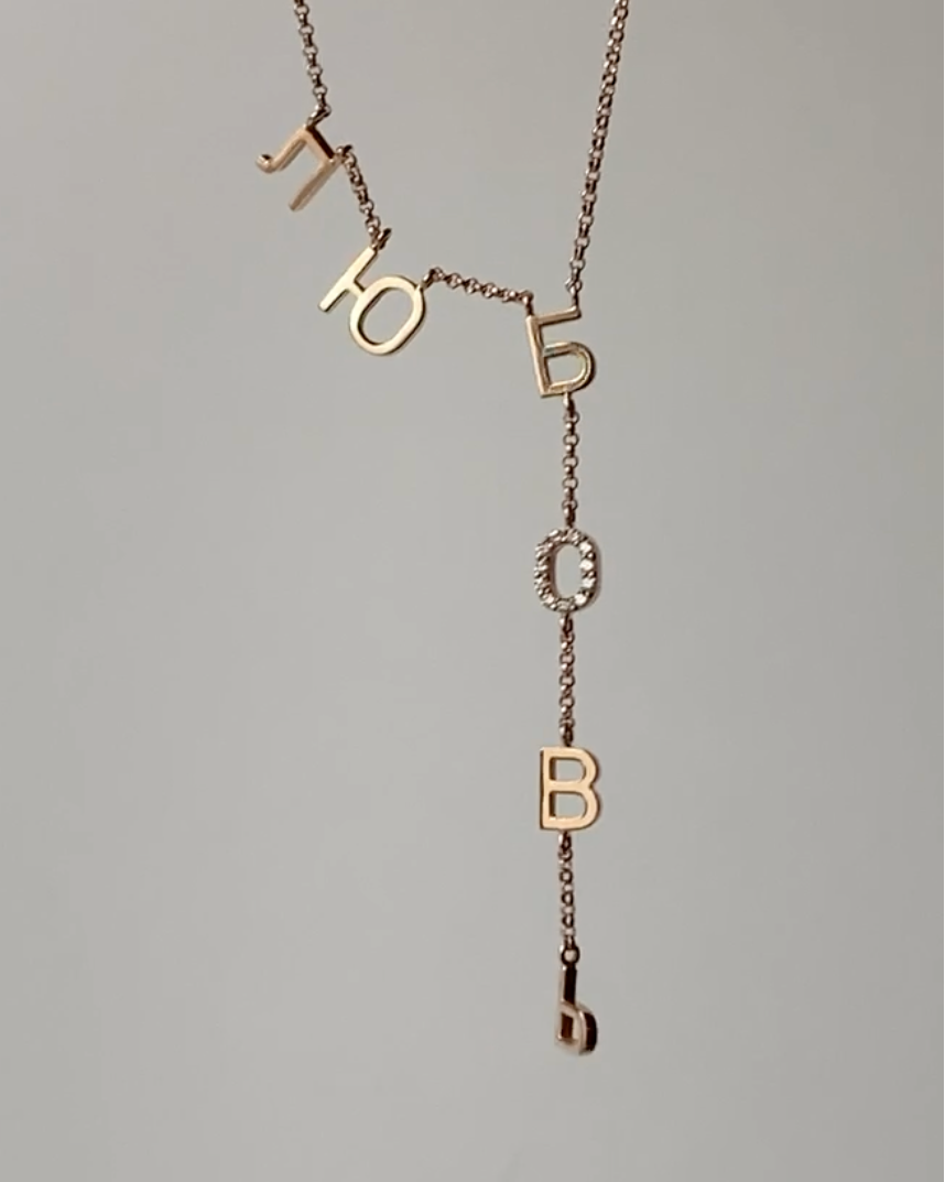 Gold ЛЮБОВЬ necklace with diamonds