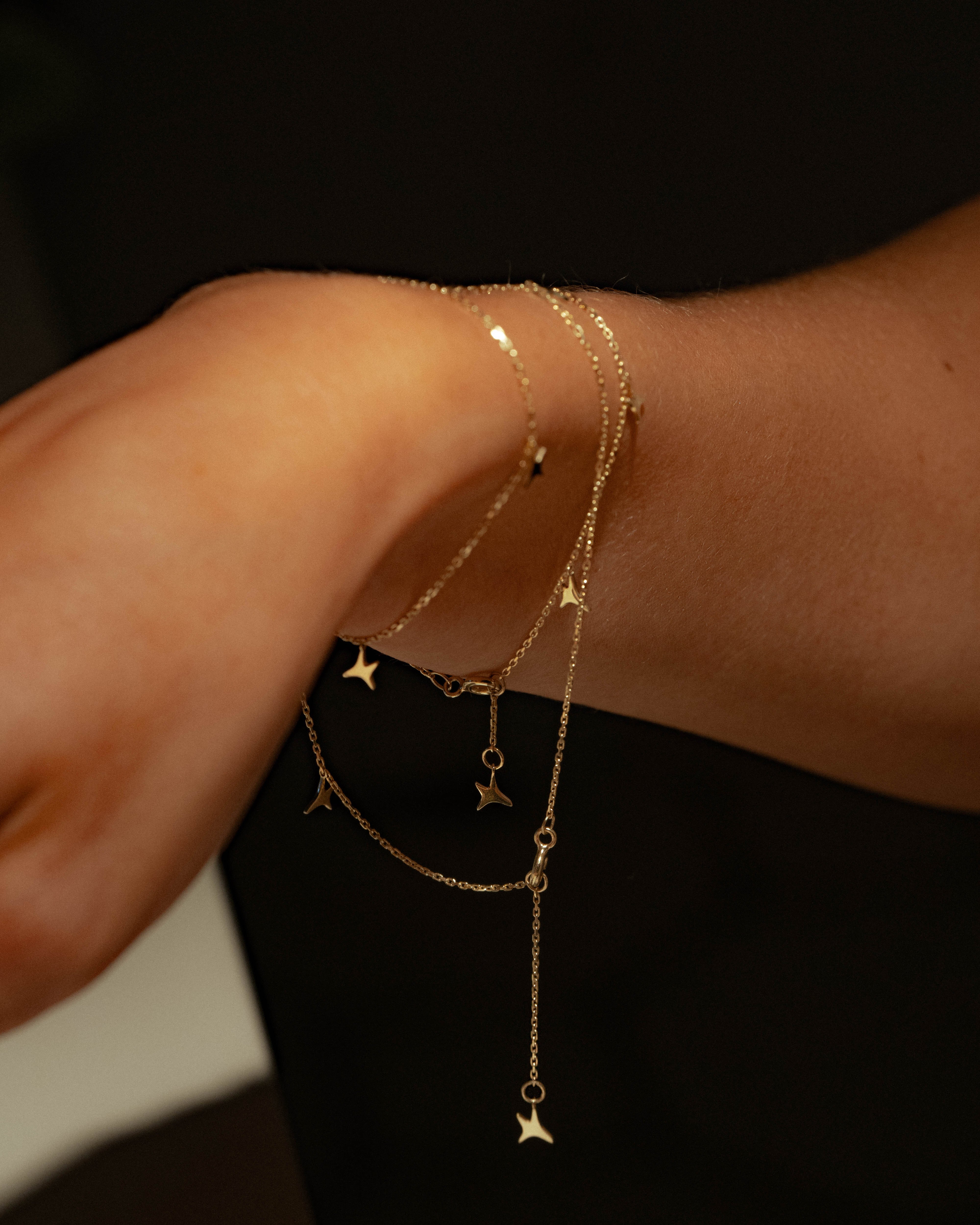 Pulsera AUMI estrellas oro amarillo