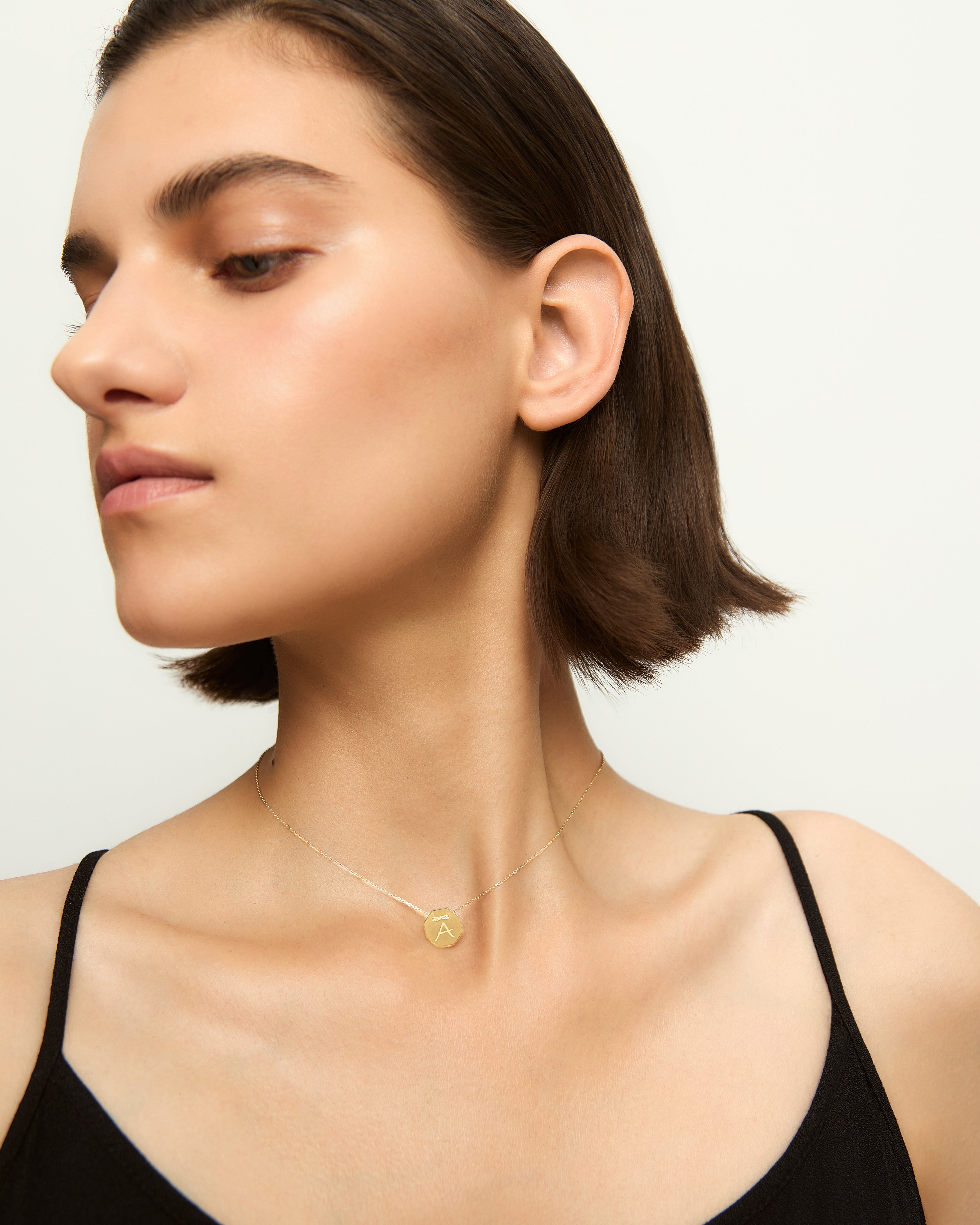 Yellow gold Letters medallion