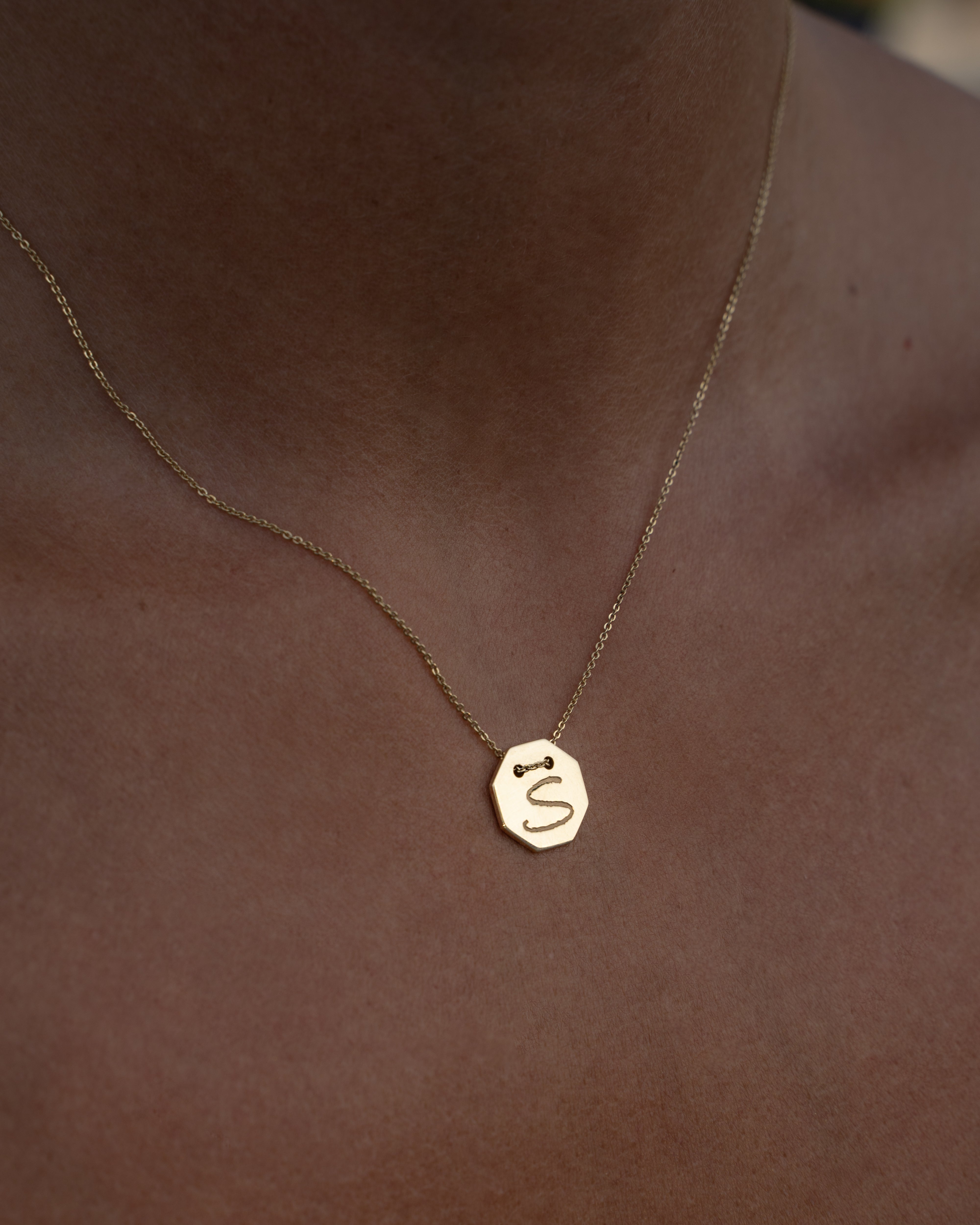 Yellow gold Letters medallion