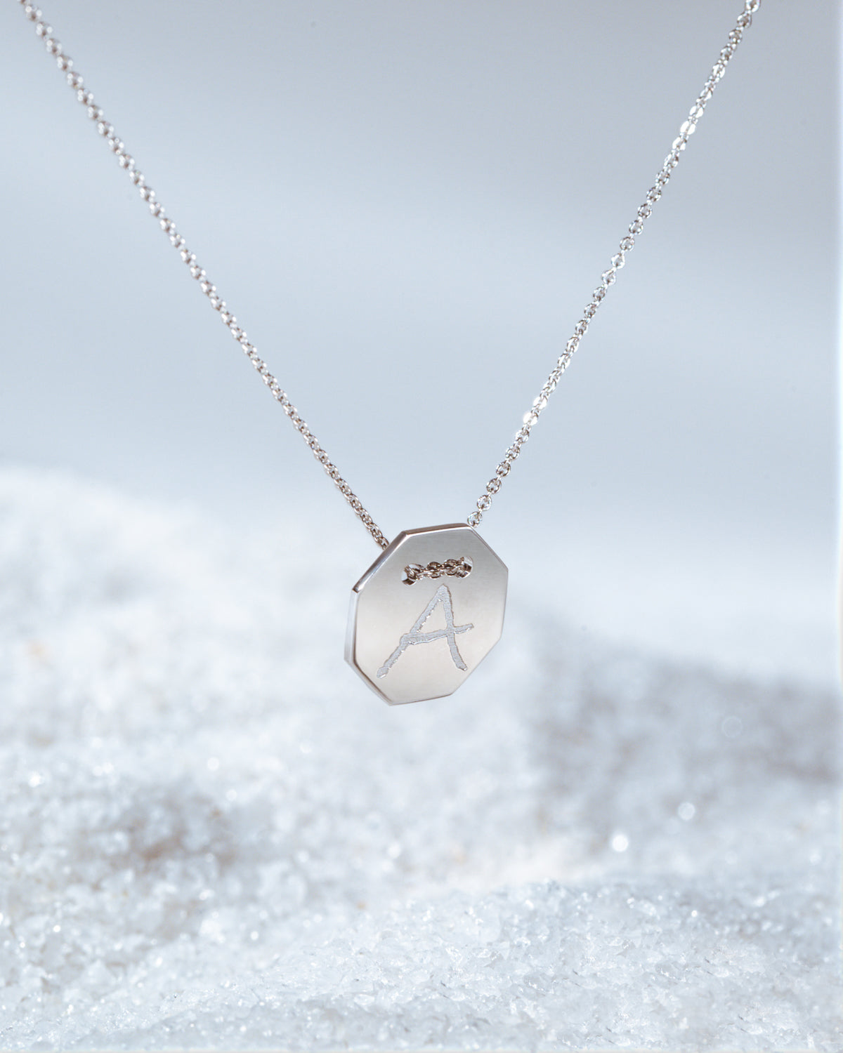 White gold Letters medallion