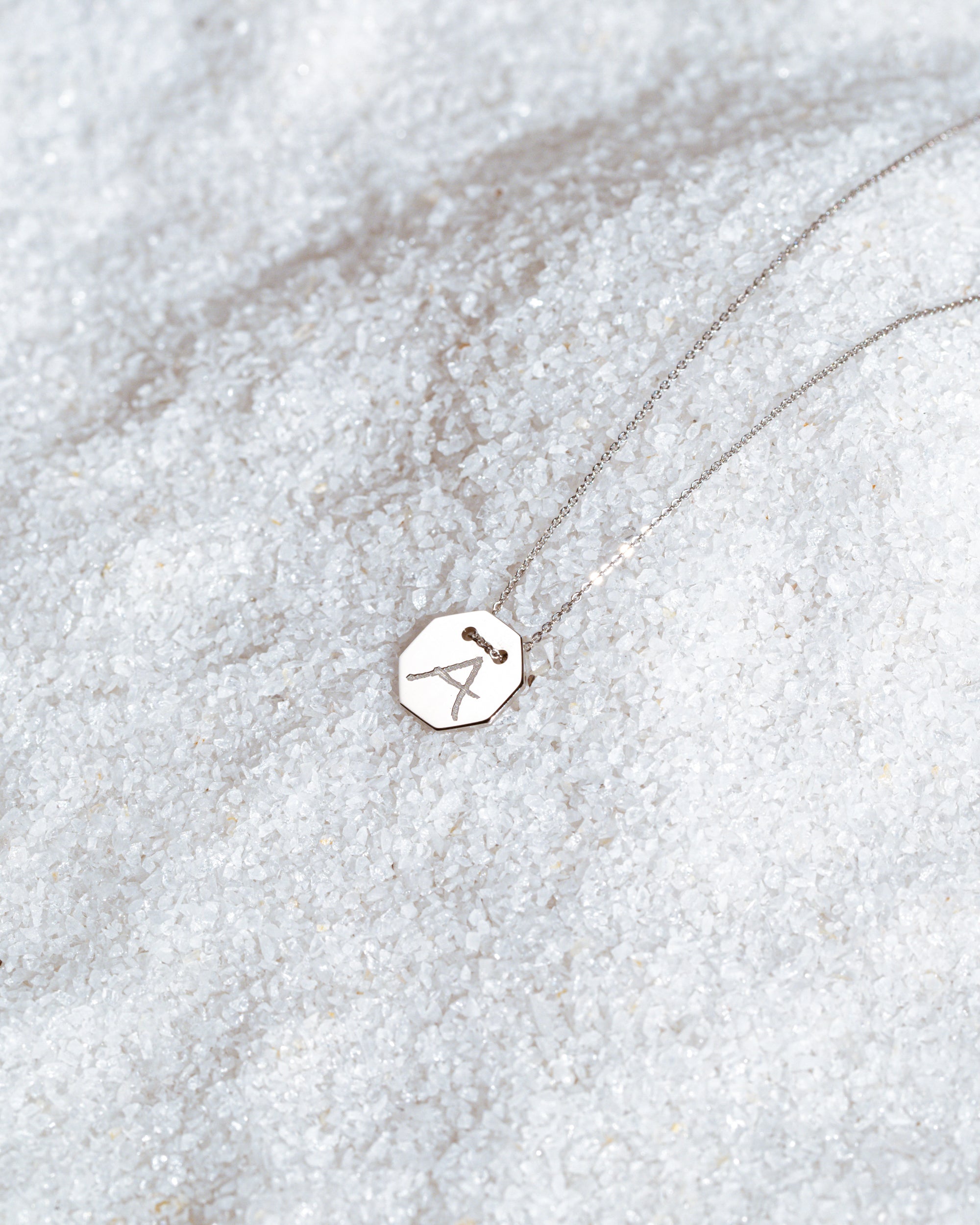 White gold Letters medallion