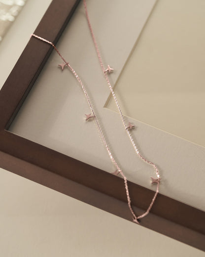 Rose gold AUMI stars necklace