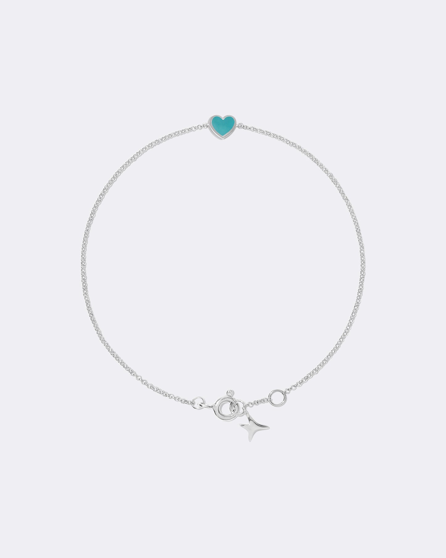 Pulsera de oro blanco con corazón de turquesa