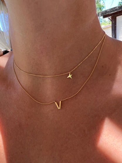 Yellow gold aumi star necklace