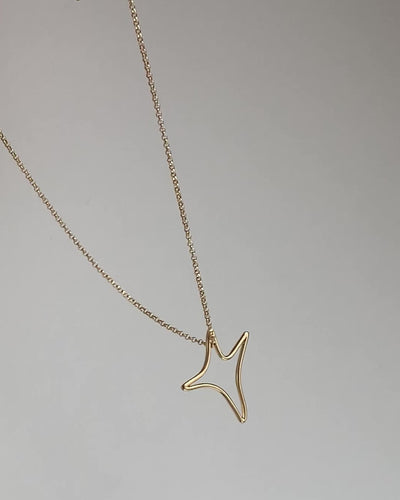 Yellow gold Big aumi star necklace